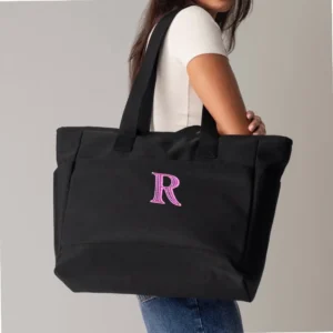 Bolso universitario color negro con tejido repelente al agua